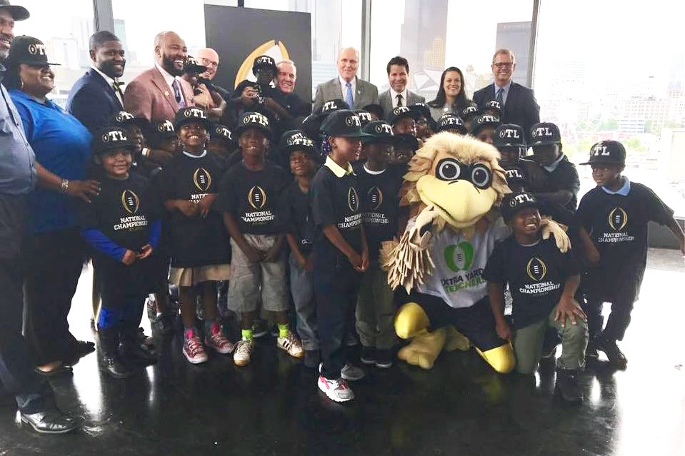 football championship in Atlanta students with mascot
