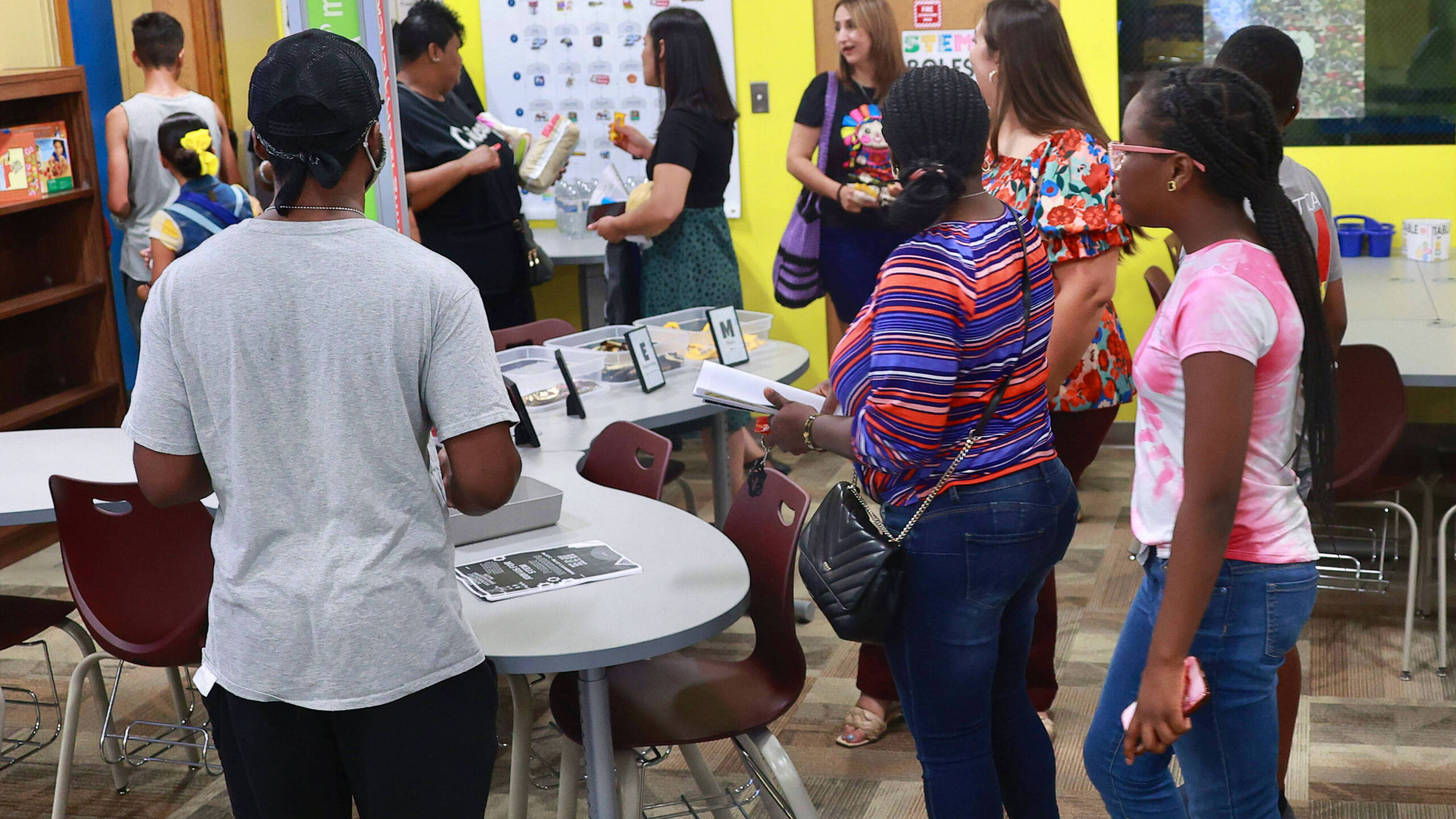 Students at Lincoln Elementary School in Calumet City, Illinois, take their families through an open house.