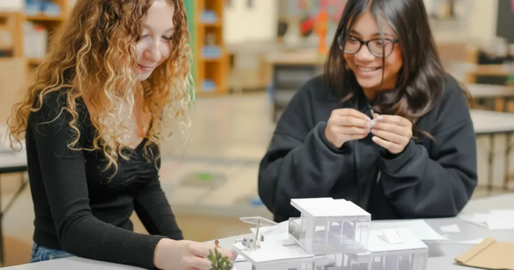 two students participating in a smart lab